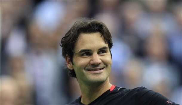 Федерер на седми пореден полуфинал, очаква Давиденко